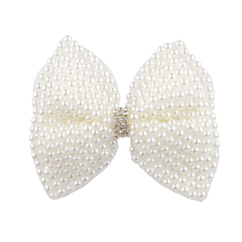 Pearl bow with rhinestone on a clip