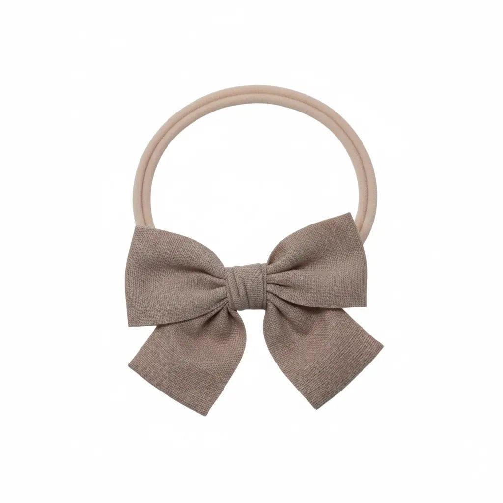 Dusky pink bow fabric bow on a headband Cute Cute