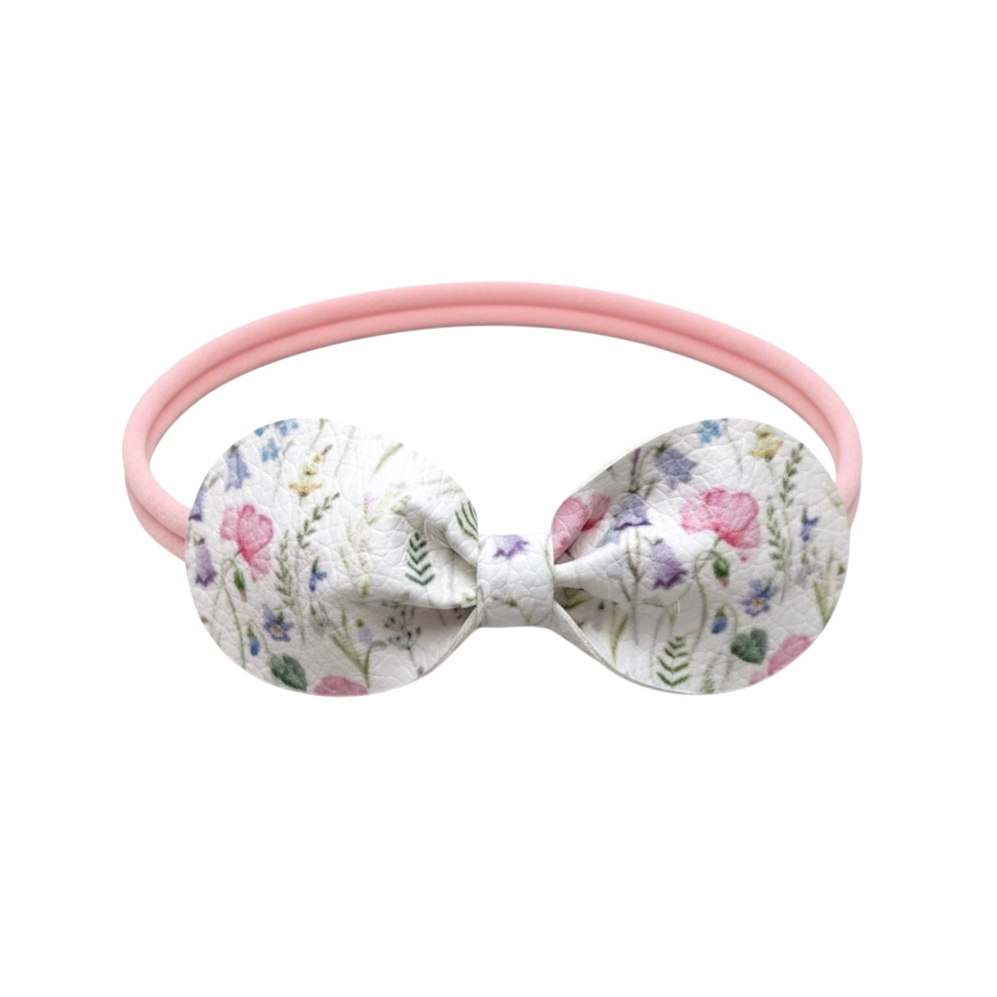 Floral leatherette bow on a headband