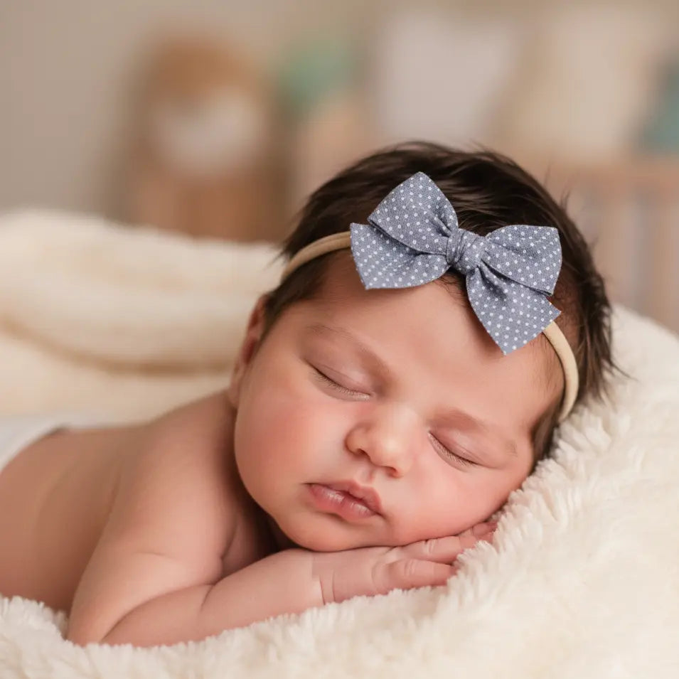 Polka dot blue fabric bow on a headband Cute Cute