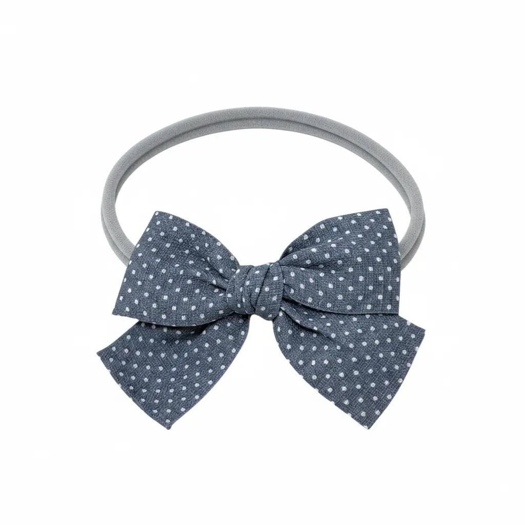 Polka dot blue fabric bow on a headband Cute Cute