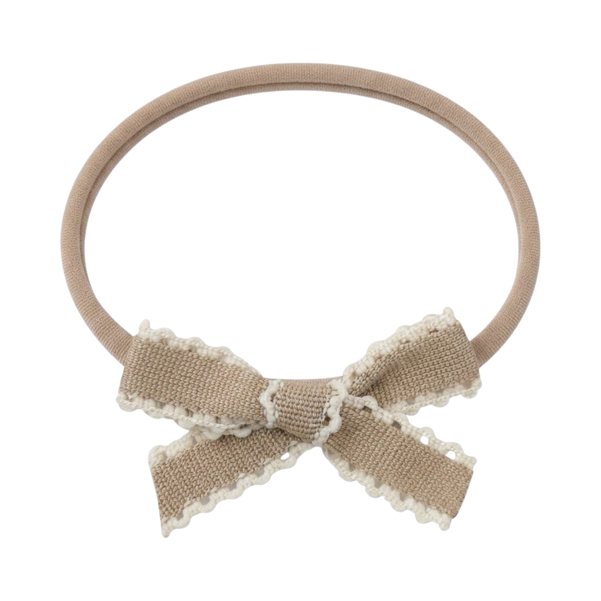 Small scalloped bow on a skinny soft nylon headband