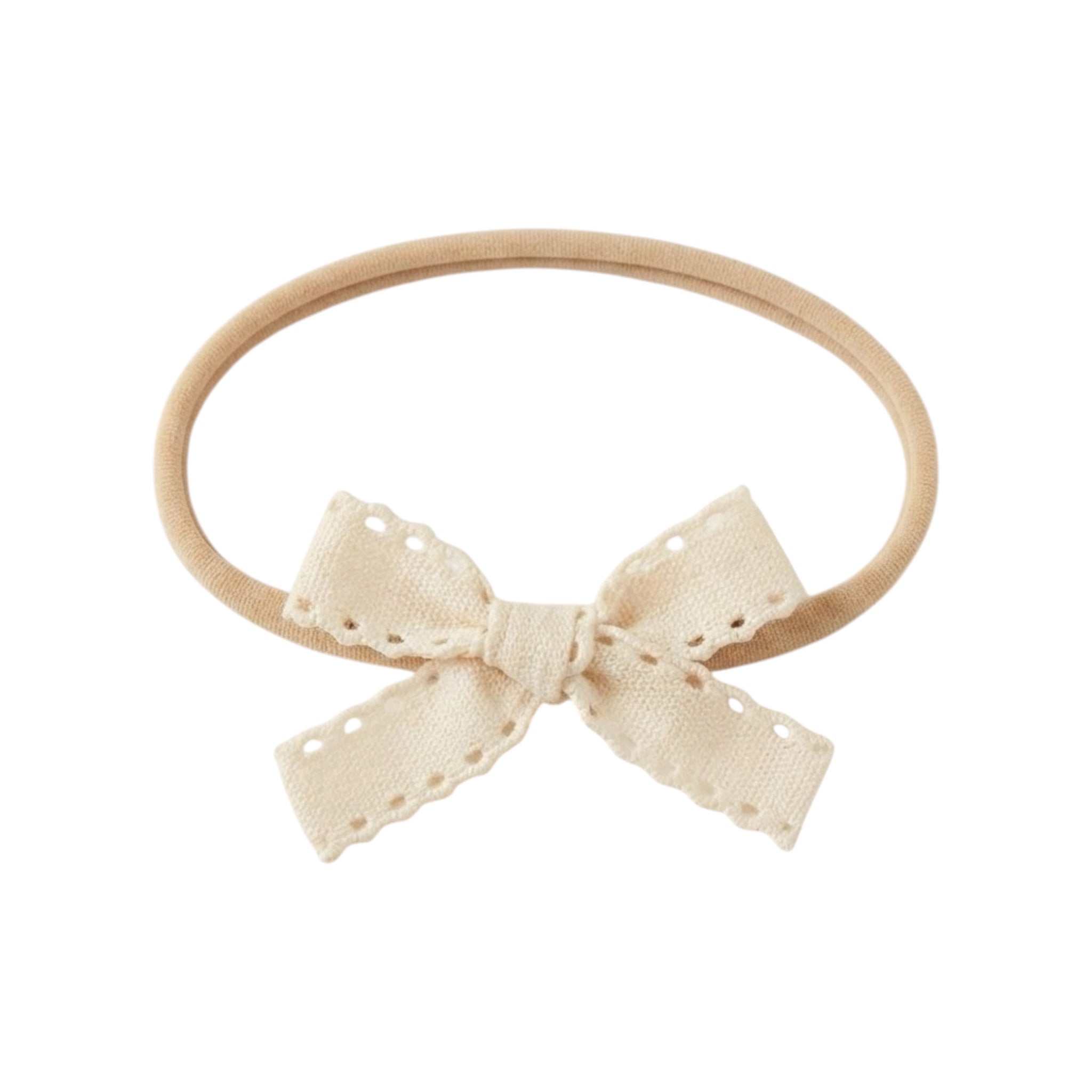 Ivory small scalloped bow on a skinny soft nylon headband