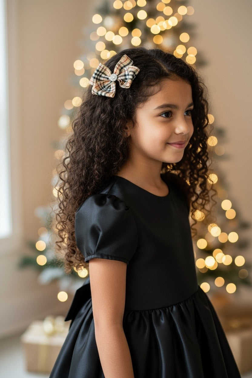 Checked black, red and ivory bow