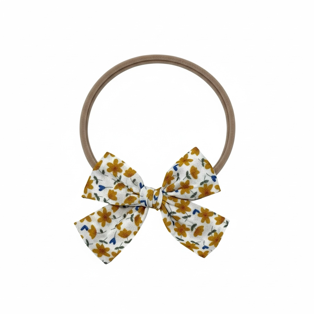Mustard flowers fabric bow on a headband