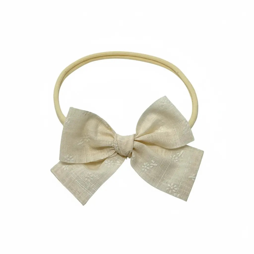 Ivory floral fabric bow on a headband Cute Cute