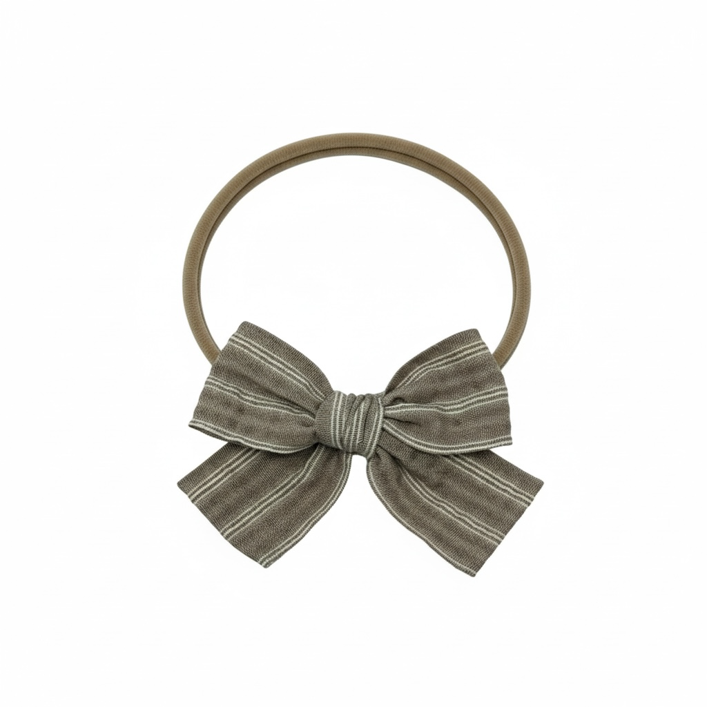 Stripy brown fabric bow on a headband
