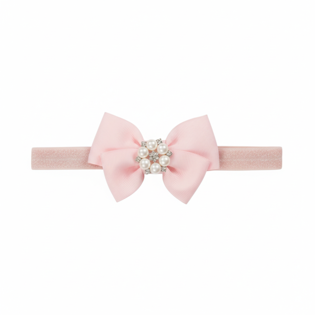 Grosgrain bow with pearl rhinestone on a headband