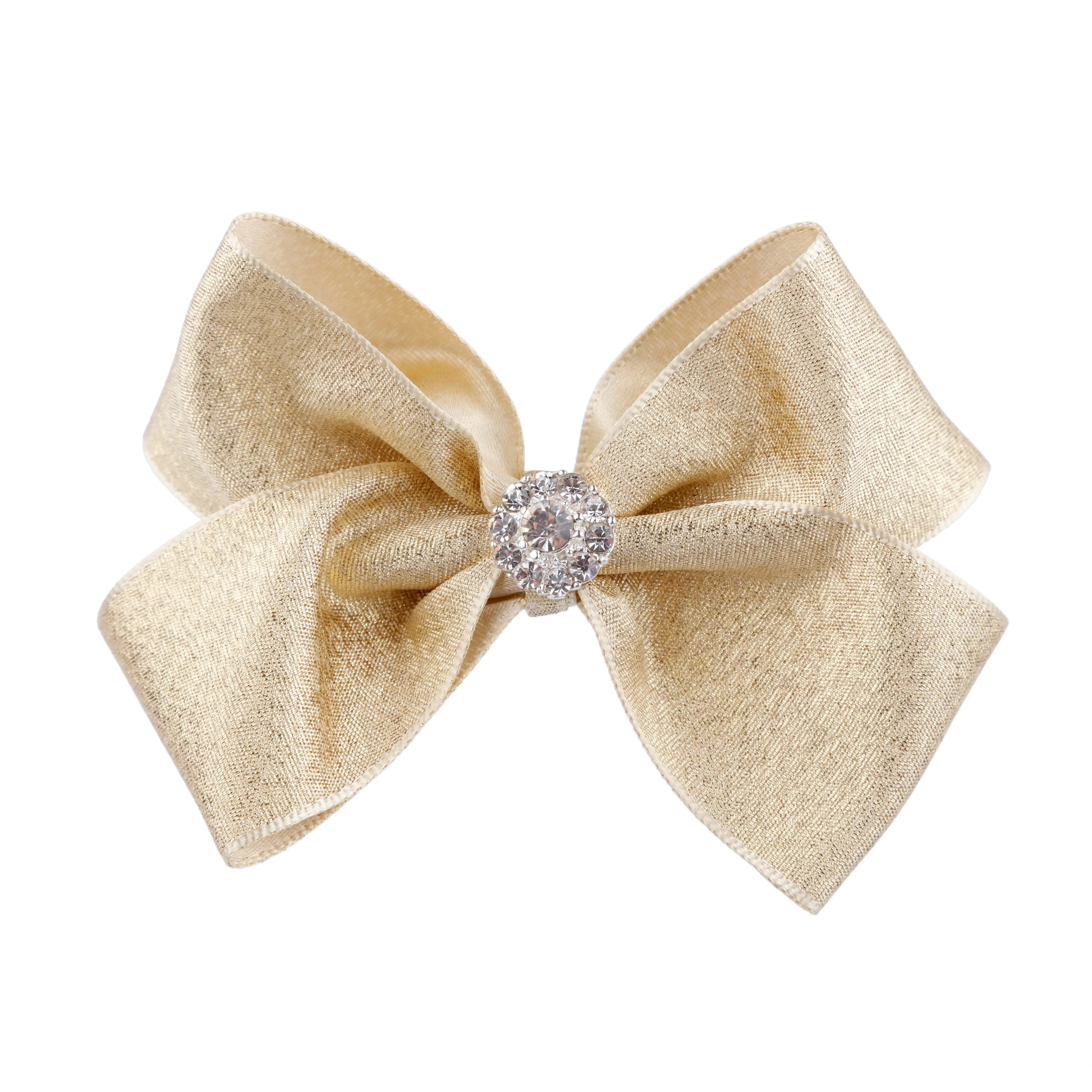 Large double satin shimmery gold bow on a clip. Cute Cute