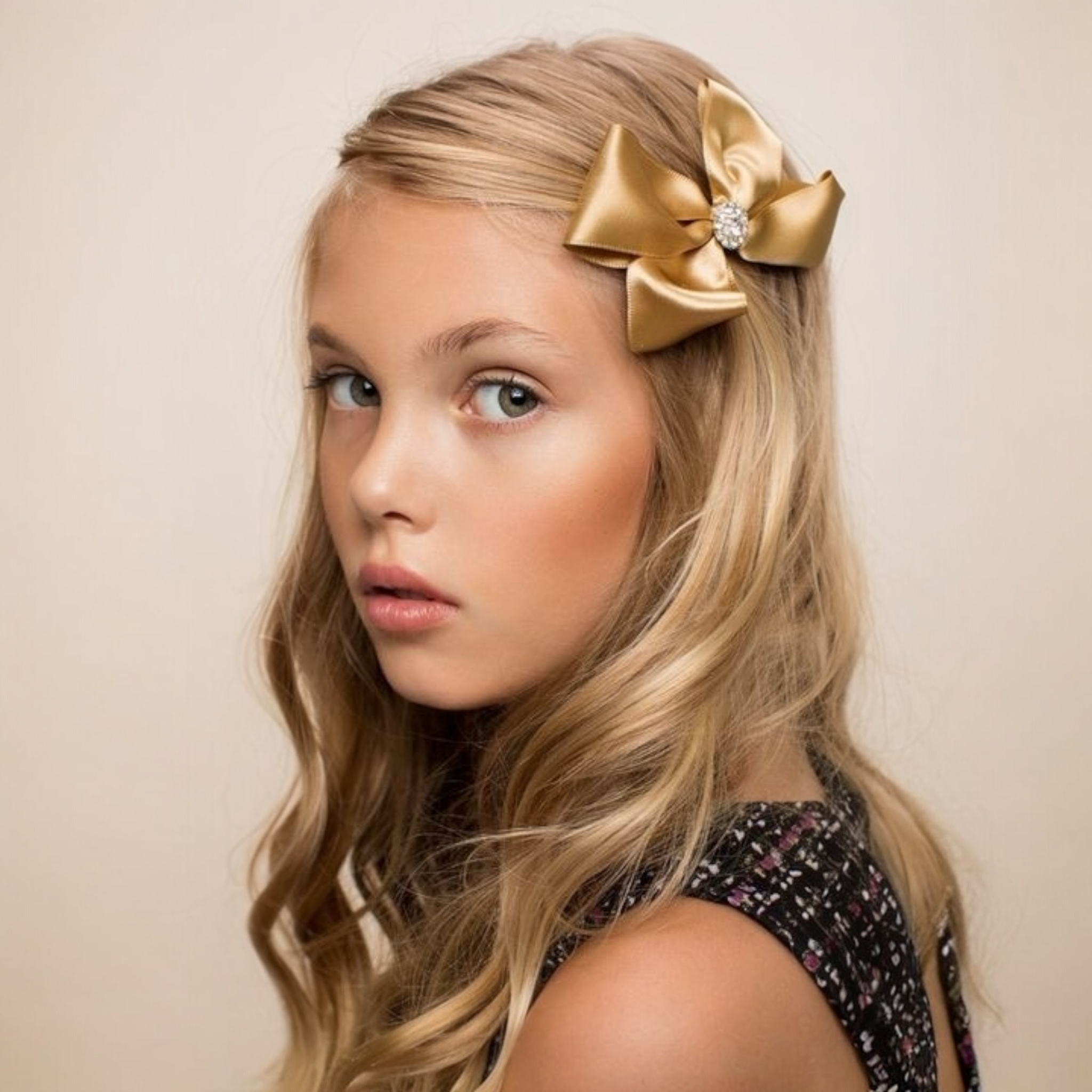 Large double satin bow with a rhinestone