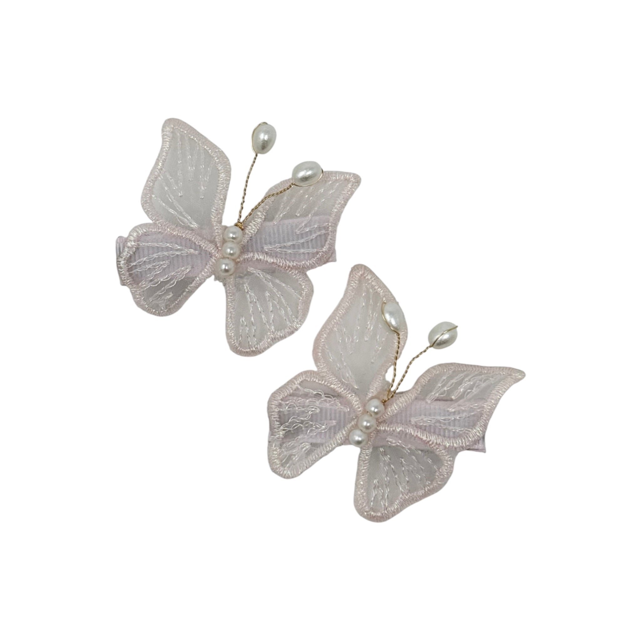Set of two butterflies with pearls on a clip