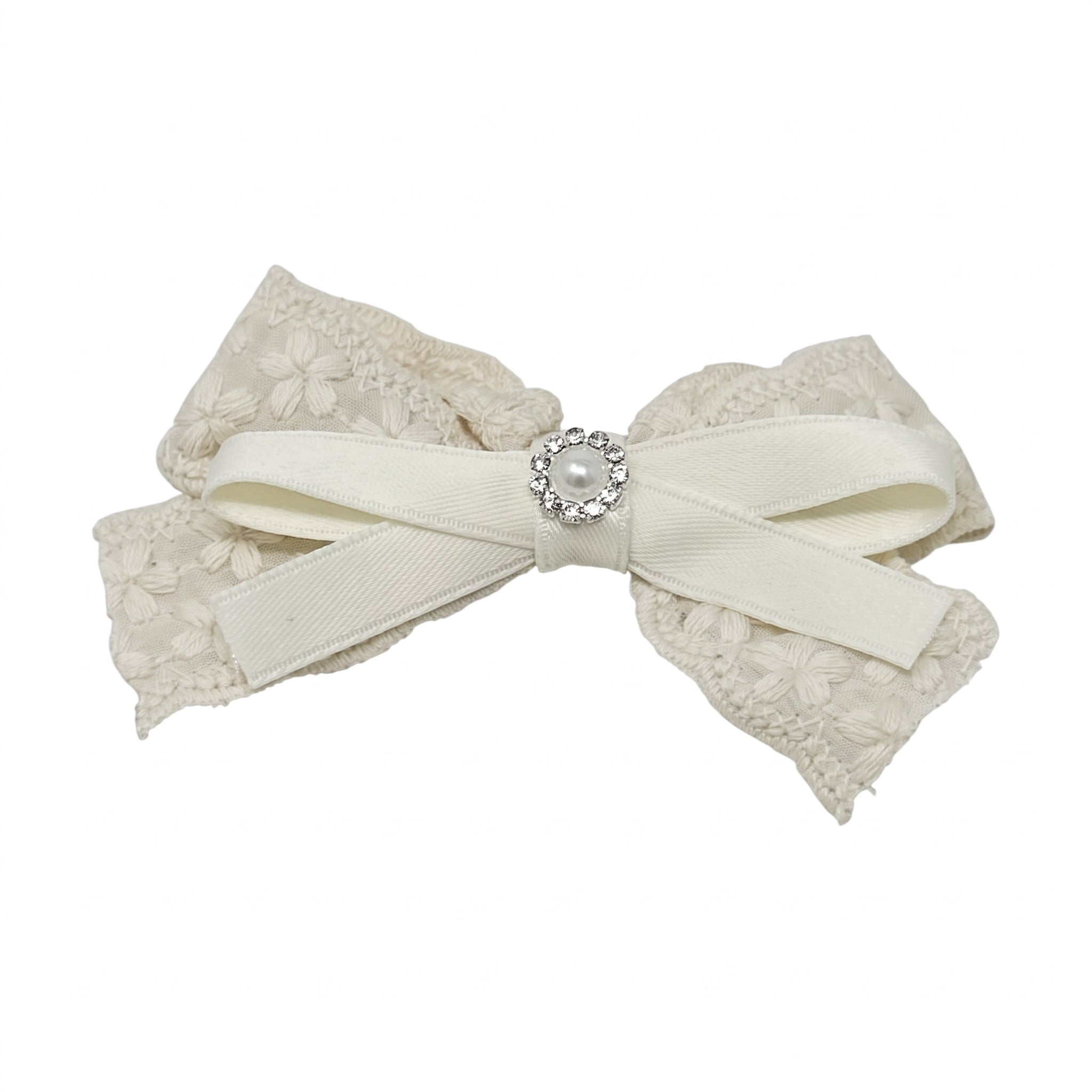 Ivory lace bow with pearl rhinestone on a clip