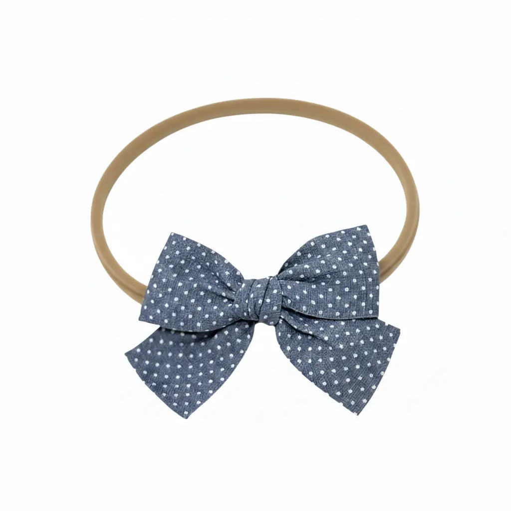 Polka dot blue fabric bow on a headband Cute Cute