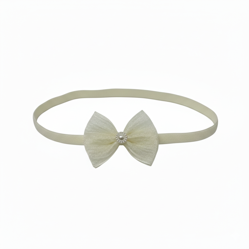 Ivory bow with pearl on a headband