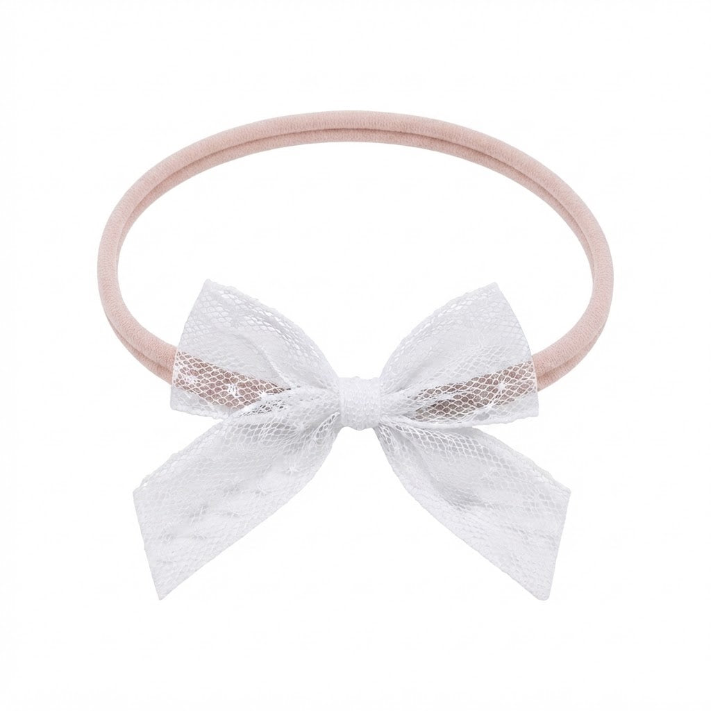 White lace bow on a skinny soft nylon headband