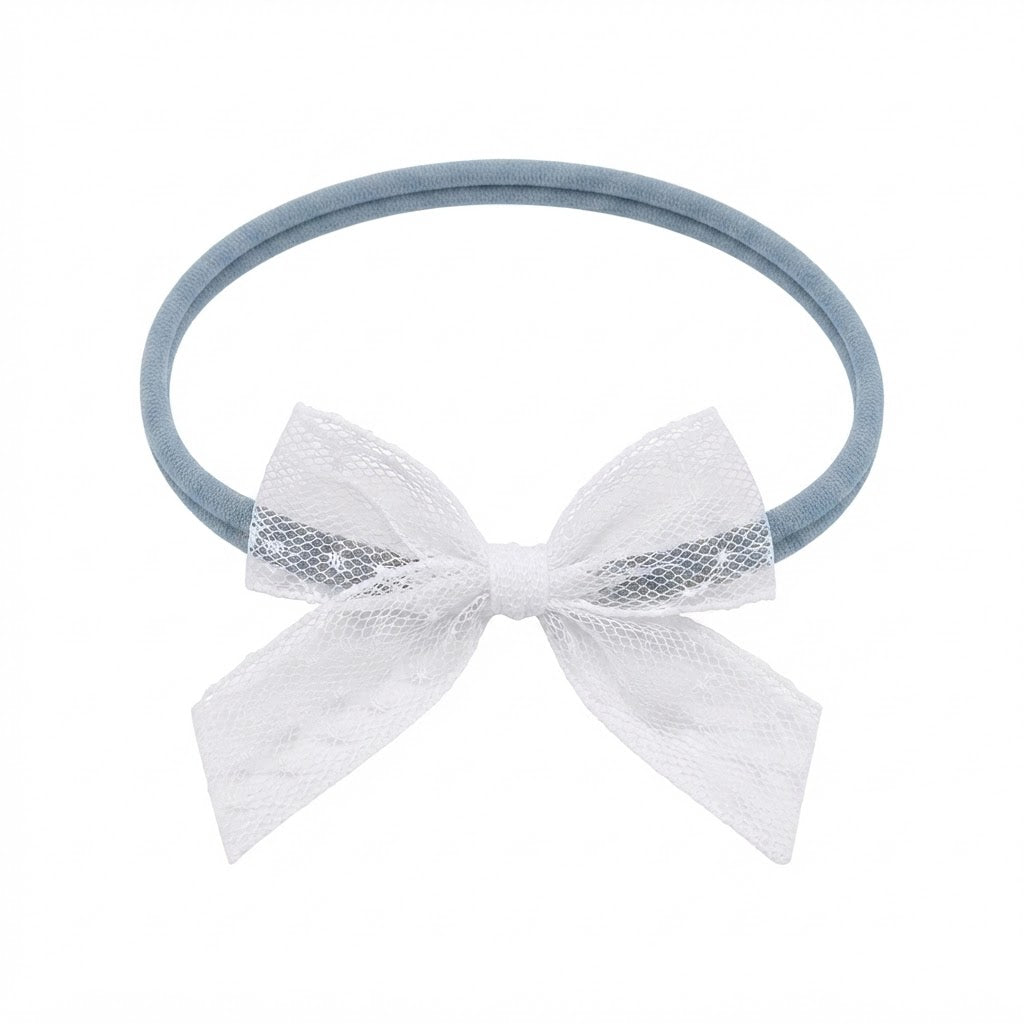 White lace bow on a skinny soft nylon headband