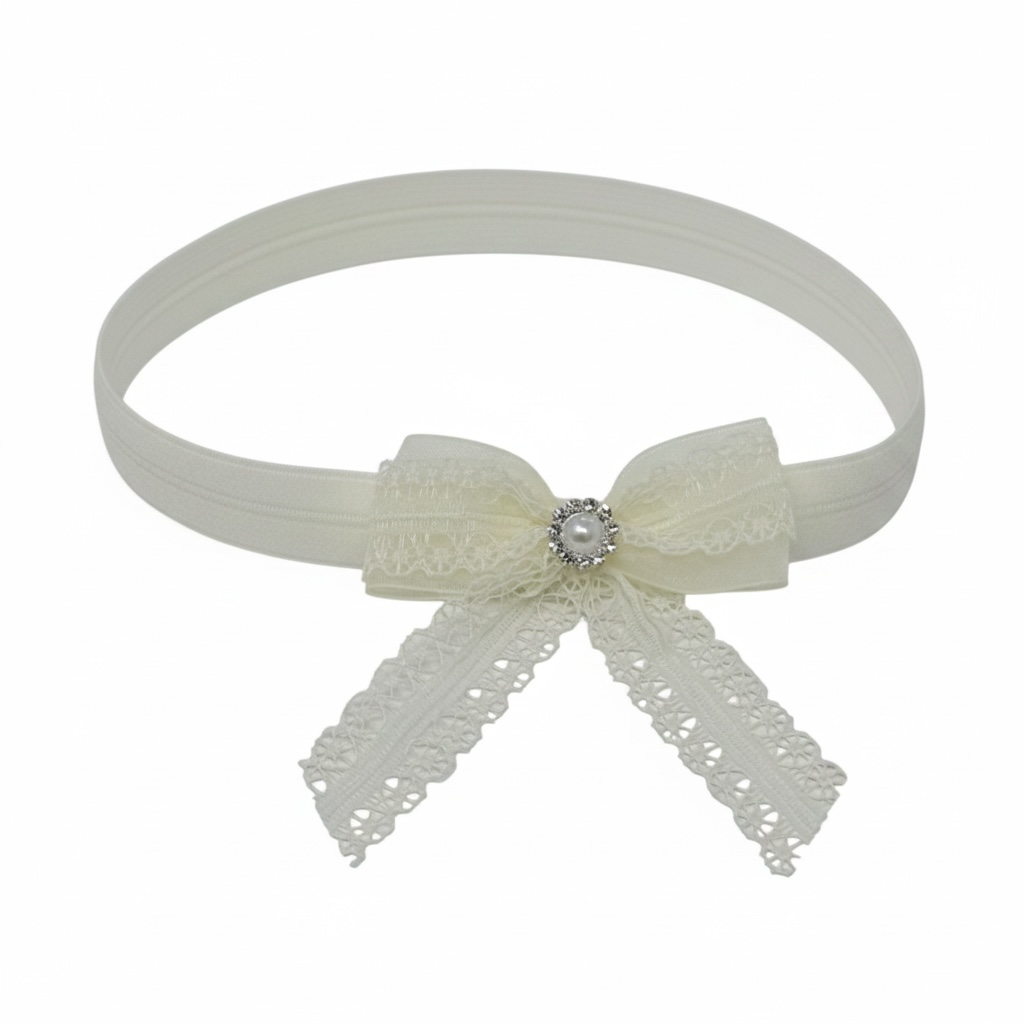 Lace ivory bow with pearl and rhinestone on a headband
