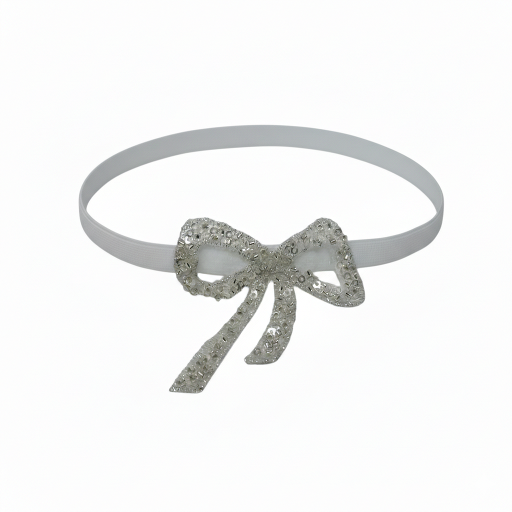 Sequin silver bow on a headband