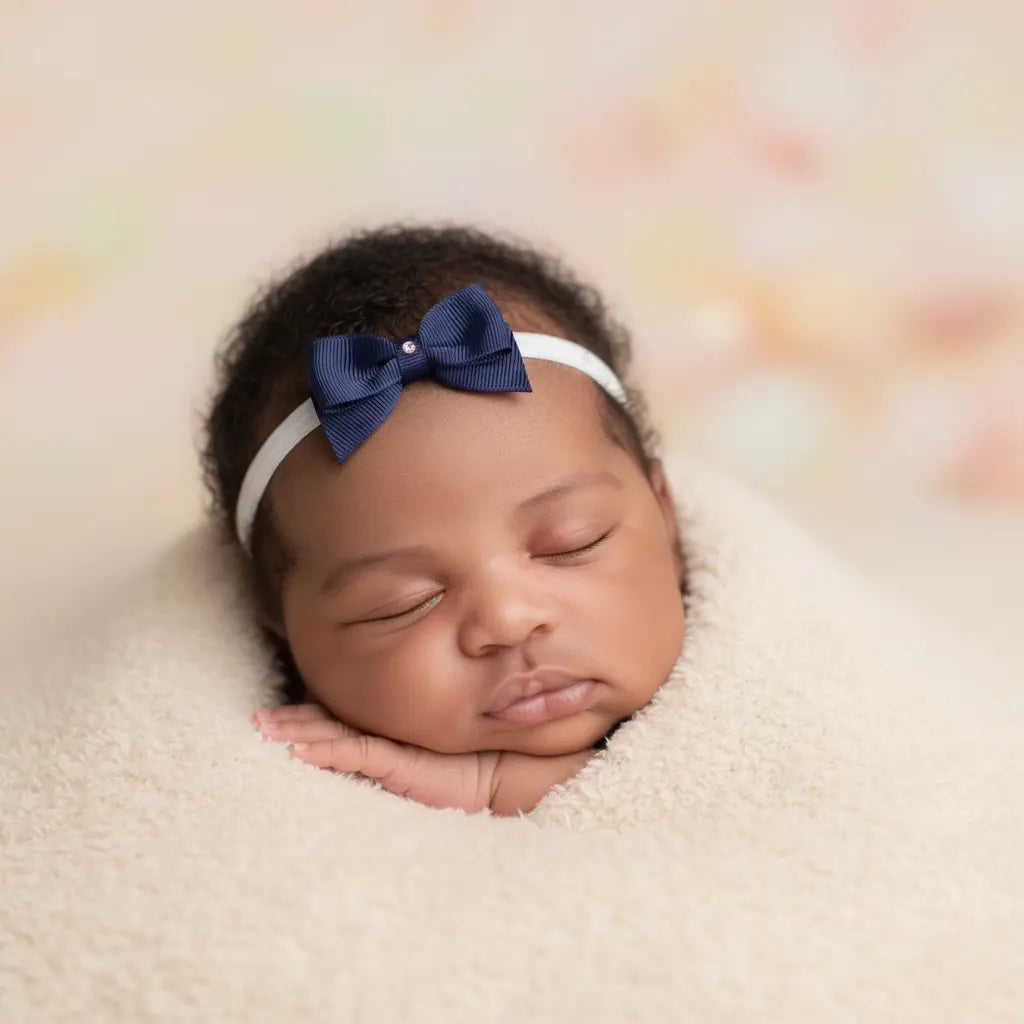 Small navy bow with tails on a soft elastic headband Cute Cute