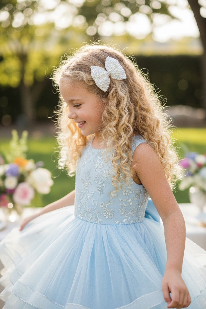 Pearl bow with rhinestone on a clip