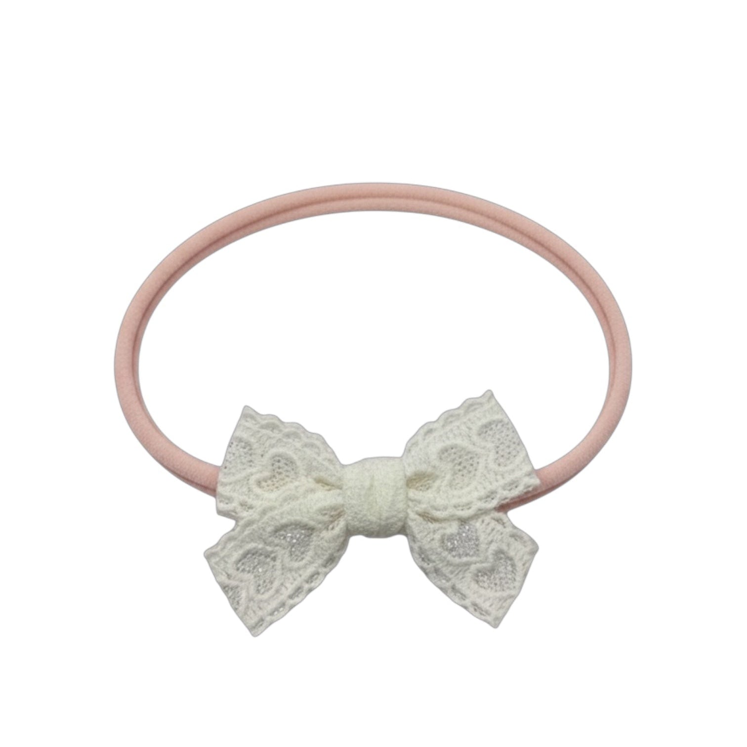 White lace bow on a pink nylon headband