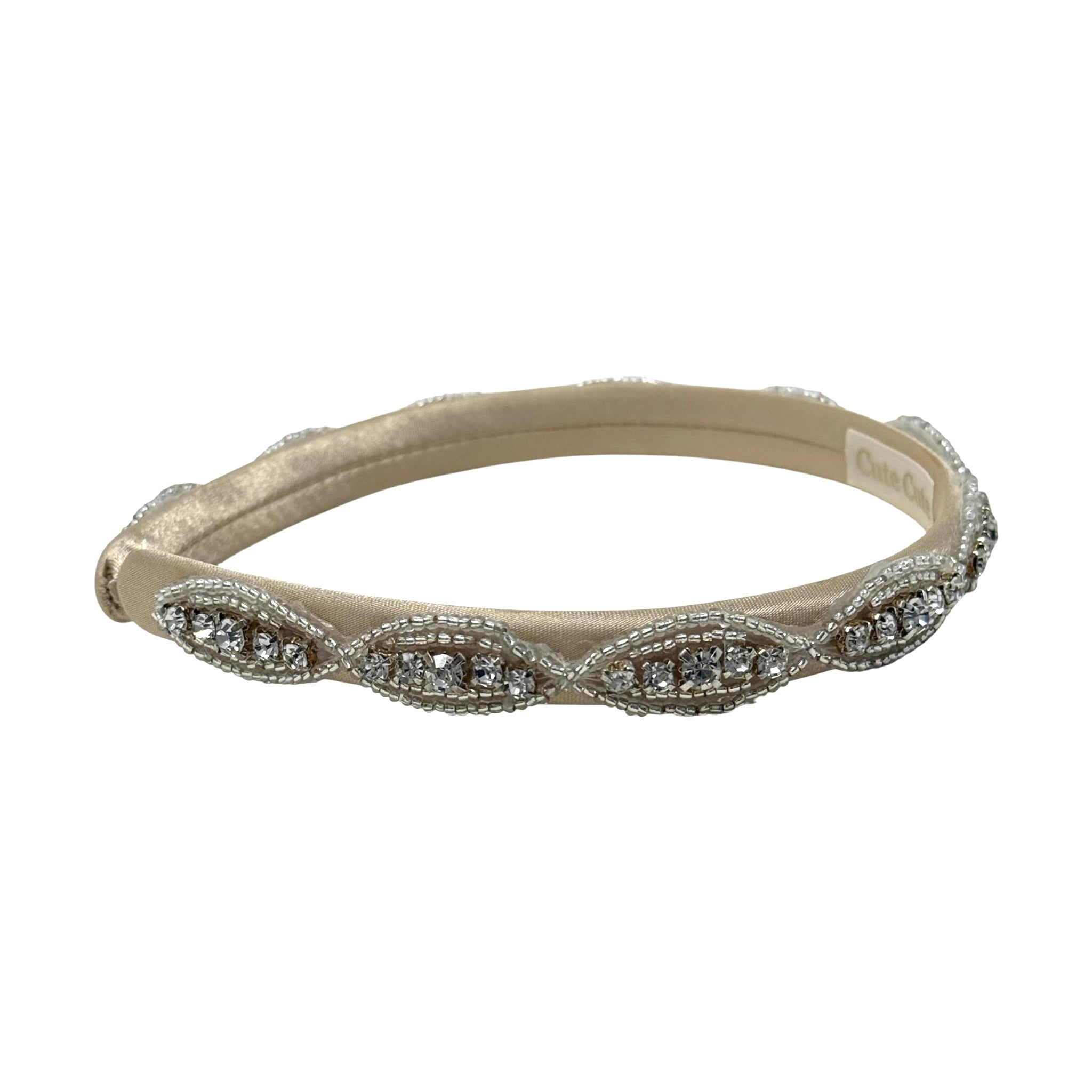Crystal diamante trim on a champagne satin alice band