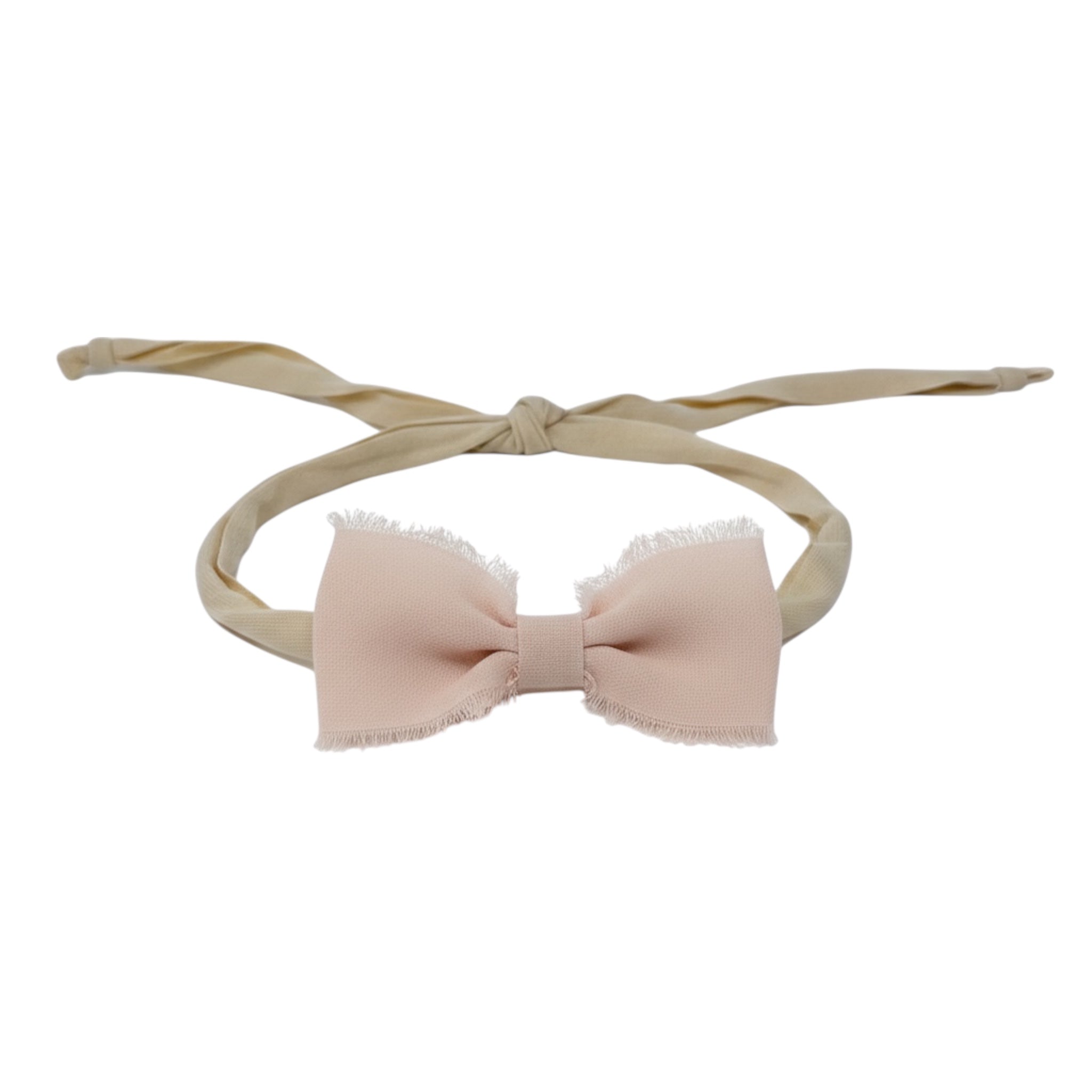 Frayed chiffon bow on an ivory tie back