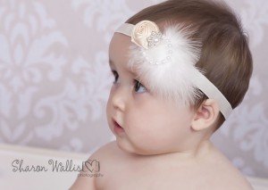Ivory satin rose with marabou feather and rhinestone flower