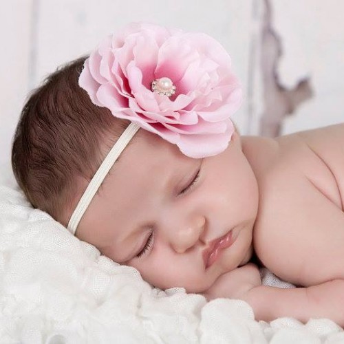 Pink two-toned flower with rhinestone on a soft elastic headband