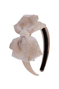 Exclusive gold and ivory oversized bow solid headband